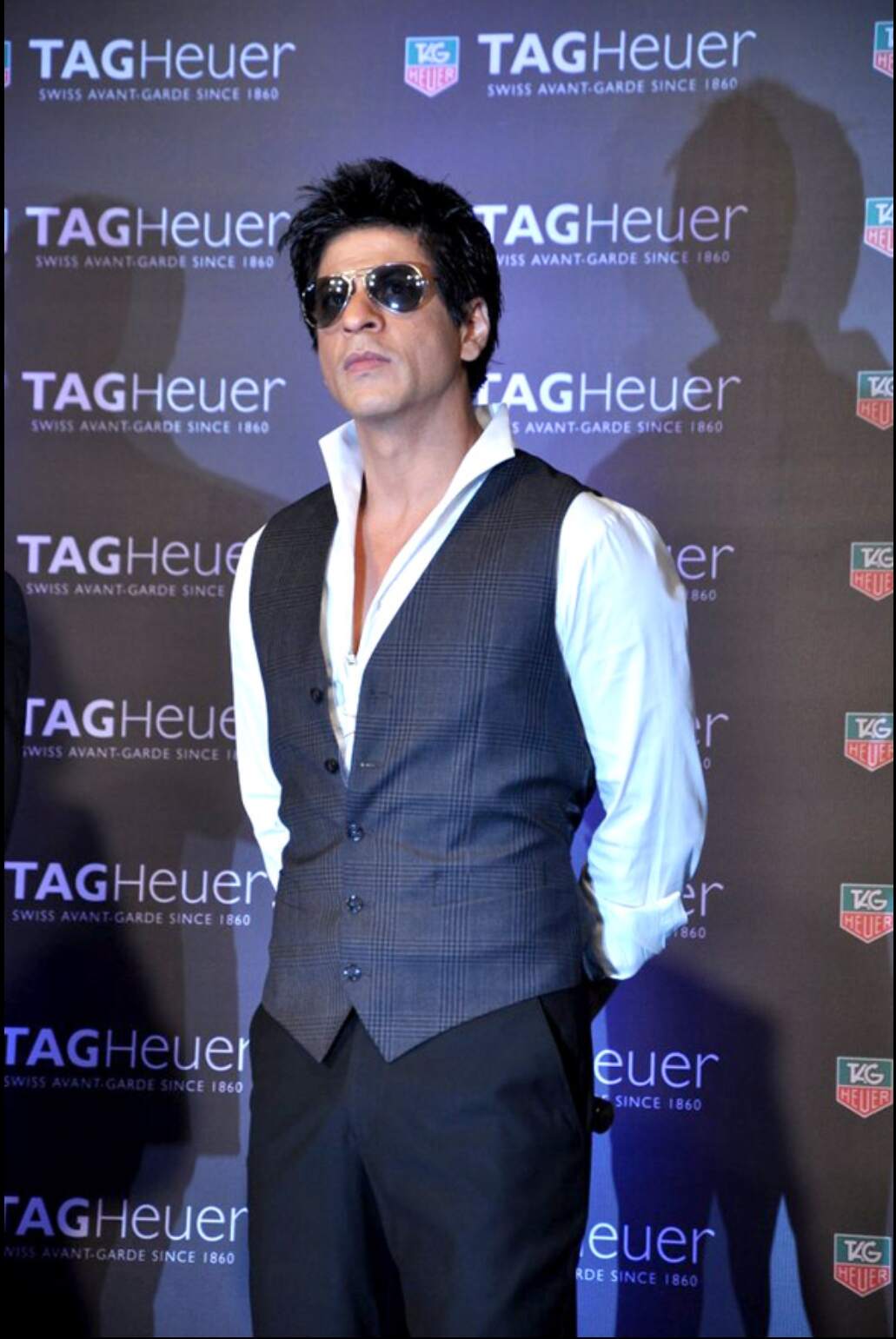 Khan at a Tag Heuer press conference, promoting the Carrera Monaco GP watch in 2012