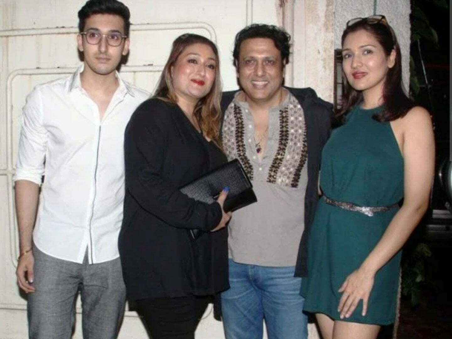 Govinda with his wife and children